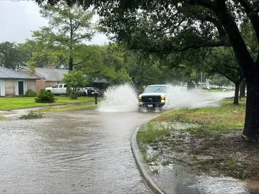 Family disaster preparedness in Houston preparing for severe weather.